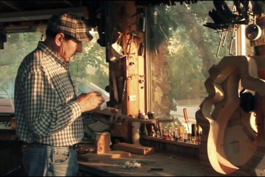 Man building a guitar